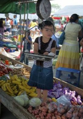 Young girl at farmer's market in Belize – Best Places In The World To Retire – International Living